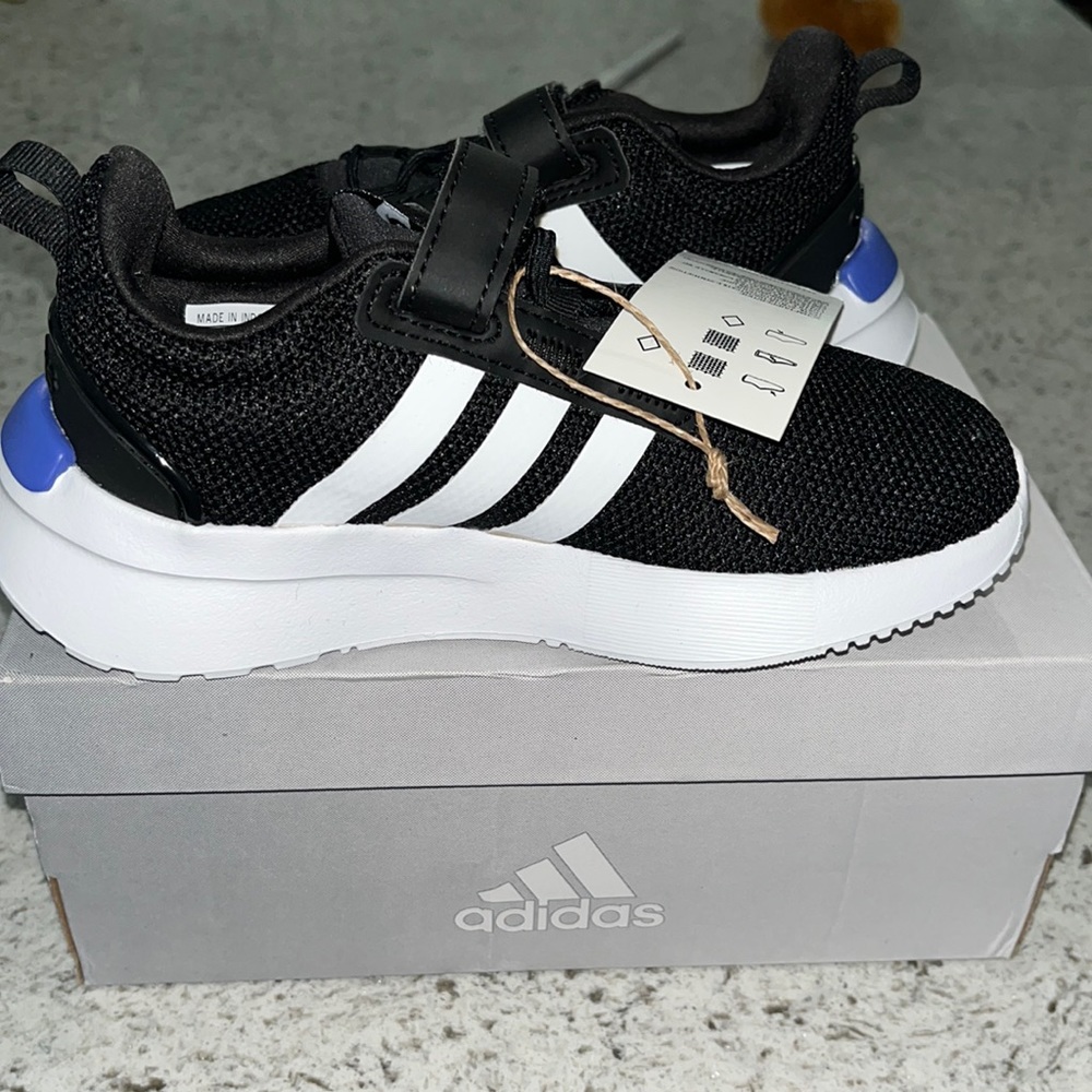 Brand new Adidas child size 12 racer TR 21C